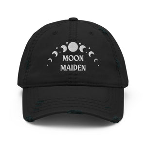 distressed baseball cap black, with image phrase "Moon Maiden," and image graphic of moon phases. background:  Christmas gifts.