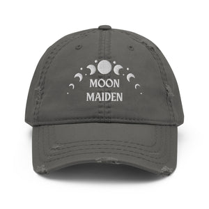 distressed baseball cap charcoal grey, with image phrase "Moon Maiden," and image graphic of moon phases. background:  Christmas gifts.