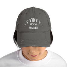 Load image into Gallery viewer, distressed baseball cap charcoal grey, with image phrase &quot;Moon Maiden,&quot; and image graphic of moon phases. background:  Christmas gifts.
