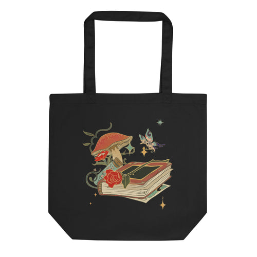 black tote bag, cotton, certified organic, with Image Design: Old book, vial, mushroom, and butterfly with a vintage look