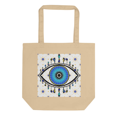 oyster colored tote bag with image of eye of protection/evil eye, colors of golden yellow, blue, light blue, third eye, eye, celestial stars. certified organic, cotton.