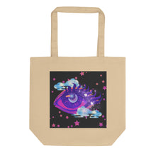 Load image into Gallery viewer, oyster beige tote bag, certified organic, tote bag, dreamy eye with a crescent moon in the iris, surrounded by soft, whimsical clouds, pink and purple stars, orange highlights.
