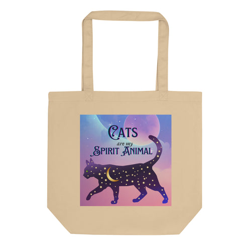 tote bag with words: cats are my spirit animal, cosmic cat silhouette, cat silhouette, cat outline, moon, stars, purple and blue