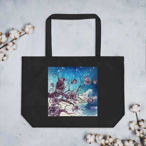 Large black tote bag, certified organic. Image design: Design: Watercolor raven and roses, with a light blue and white watercolor background and shooting stars print behind the image