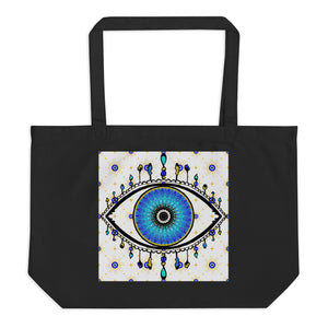 large black colored tote bag with image of eye of protection/evil eye, colors of golden yellow, blue, light blue, third eye, eye, celestial stars. certified organic, cotton.