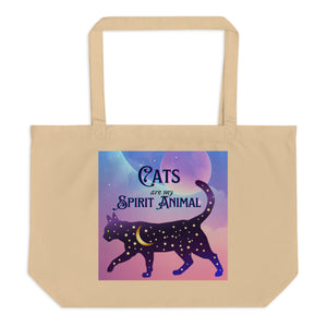 Large oyster colored tote bag, with text words: cats are my spirit animal. Image design: cosmic cat silhouette, cat silhouette, cat outline, moon, stars, purple and blue