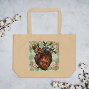 large oyster colored tote bag, cotton, certified organic. Image design: Red illustrated heart with vines and rose, wavy green checkered print background  behind the image