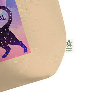 close up of tag of large oyster colored tote bag, showing certified organic, with text words: cats are my spirit animal. Image design: cosmic cat silhouette, cat silhouette, cat outline, moon, stars, purple and blue