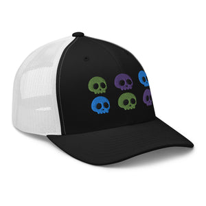 retro trucker hat black white, with image design of 6 purple, green, and blue skulls, 2 of each color, in two rows.  side view.