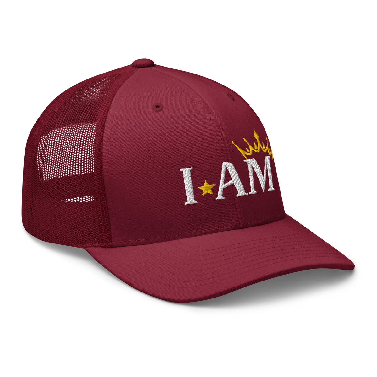 retro trucker hat cranberry red, with image phrase: "I AM," with image graphic of a gold crown over the letter M. side view.
