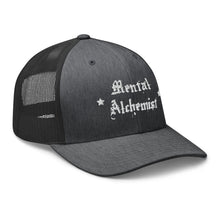 Load image into Gallery viewer, retro trucker hat dark grey heather, with image phrase: &quot;Mental Alchemist.&quot; side view.
