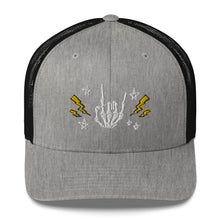 Load image into Gallery viewer, retro trucker hat/cap heather grey black , with image design of rock on skeleton hand, pentagram stars, lightning symbols. Front view.
