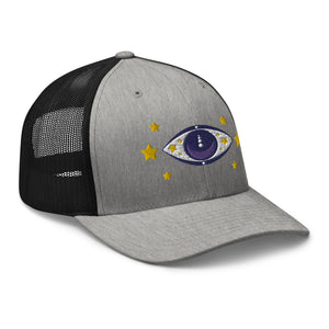 retro trucker hat heather grey black, with image graphic: purple eye of protection/evil eye, with yellow stars. Side view.