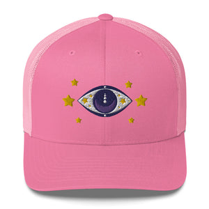 retro trucker hat pink, with image graphic: purple eye of protection/evil eye, with yellow stars. Front view.