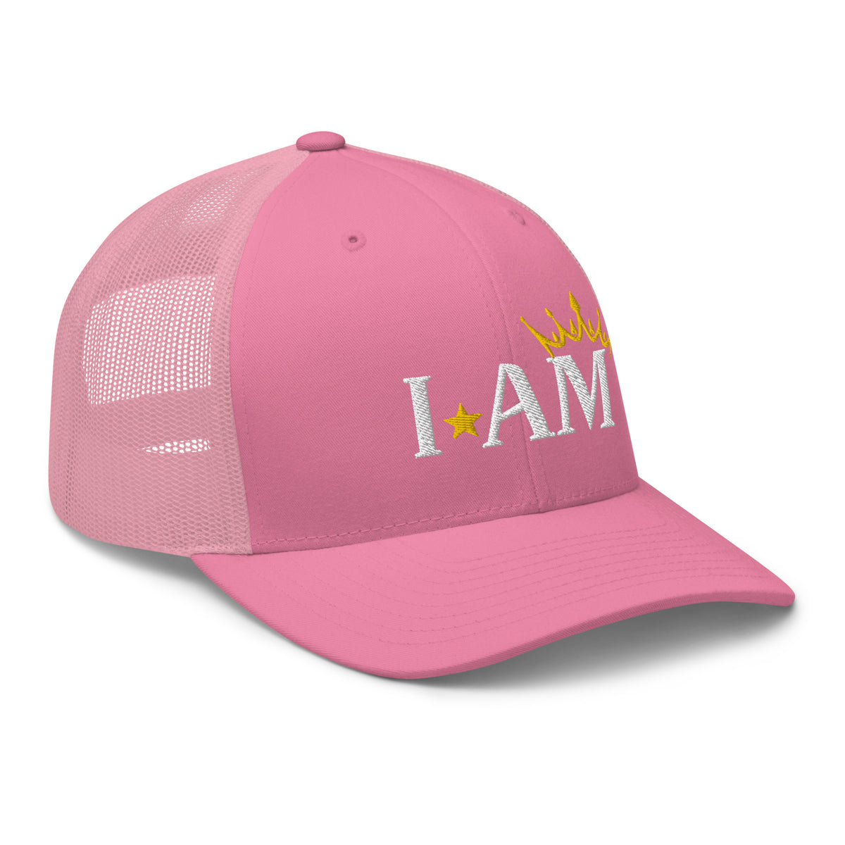 retro trucker hat pink, with image phrase: "I AM," with image graphic of a gold crown over the letter M. side view.