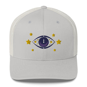 retro trucker hat silver, with image graphic: purple eye of protection/evil eye, with yellow stars. Front view.