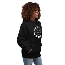 Load image into Gallery viewer, unisex black hoodie with image phrase &quot;The moon made me do it.&quot; Encircled in a border of moon phases. Front view.
