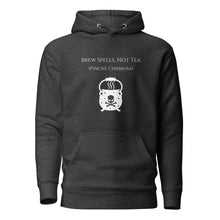 Load image into Gallery viewer, Unisex charcoal grey heather hoodie with image phrase: &quot;Brew spells, not tea (pinche chismosa).&quot; Underneath words is an image of a cauldron decorated with stars and skull with crossbones. Front view. Halloween, spooky season.
