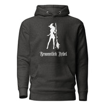 Load image into Gallery viewer, charcoal grey heather unisex hoodie, with pockets. Image design: silhouette of a pretty witch holding a magical broom, stars. Image phrase: Broomstick rebel. Front view.
