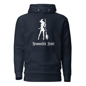 navy blue unisex hoodie, with pockets. Image design: silhouette of a pretty witch holding a magical broom, stars. Image phrase: Broomstick rebel. Front view.