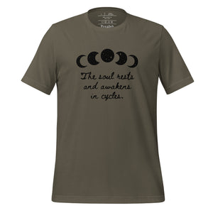 unisex army green t-shirt, with image of black celestial moon phases, with star cut outs, and image phrase "The soul rests and awakens in cycles." Front view.