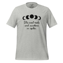 Load image into Gallery viewer, unisex heather grey t-shirt, with image of black celestial moon phases, with star cut outs, and image phrase &quot;The soul rests and awakens in cycles.&quot; Front view.
