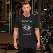 Load image into Gallery viewer, Man modeling/wearing Unisex black heather t-shirt with Image Design: Text &quot;Honor your truth, Live authentically,&quot; with center image of sun, eye in center of sun, moon in the eye&#39;s iris, stars all around.
