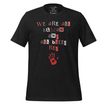 Load image into Gallery viewer, unisex black heather t-shirt with image phrase: &quot;We are all human and all bleed red.&quot; with an image graphic of a red handprint, with a heart in the middle.
