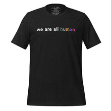 Load image into Gallery viewer, women&#39;s black heather t-shirt with image phrase: &quot;we are all human.&quot;
