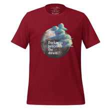 Load image into Gallery viewer, unisex cardinal red t-shirt with image design of a dark moon, with a colorful dawn cloud in front, with image phrase: &quot;Darkness precedes the Dawn.&quot; Front View.
