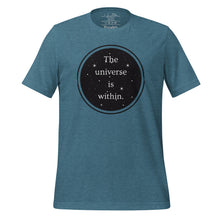 Load image into Gallery viewer, unisex heather deep teal t-shirt, with image phrase &quot;The universe is within,&quot; enclosed in a black circle and stars.
