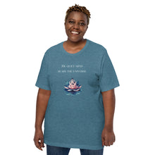 Load image into Gallery viewer, woman modeling/wearing unisex heather deep teal t-shirt, with image phrase: &quot;The quiet mind hears the Universe.&quot; Image of watercolor pink and blue lotus flower floating on water.
