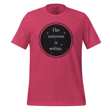 Load image into Gallery viewer, unisex heather raspberry pink t-shirt, with image phrase &quot;The universe is within,&quot; enclosed in a black circle and stars.
