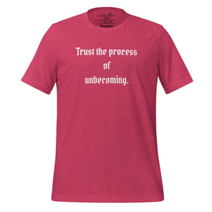 unisex heather raspberry pink t-shirt, with image phrase: "Trust the process of unbecoming" Front view.