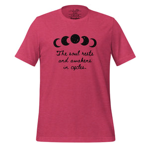 unisex heather raspberry pink t-shirt, with image of black celestial moon phases, with star cut outs, and image phrase "The soul rests and awakens in cycles." Front view.