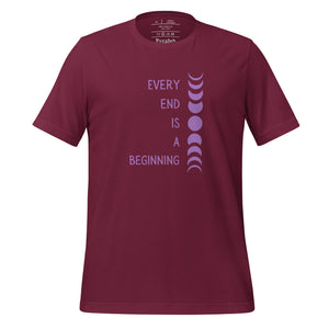 unisex maroon t-shirt with image phrase "every end is a beginning," with image design of moon phases, from new moon, to full moon, to new moon. Front view.