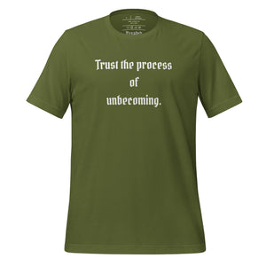 unisex olive green t-shirt, with image phrase: "Trust the process of unbecoming" Front view.