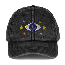 Load image into Gallery viewer, vintage denim cap black, with image design of blue eye of protection/evil eye/third eye, with stars. Front view.
