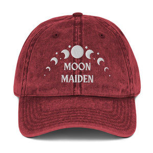 vintage denim cap maroon, with image phrase: "Moon Maiden." with moon phases. Front view.