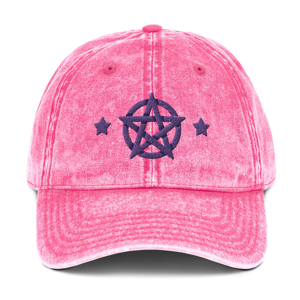 vintage denim cap pink, with image design of purple pentacle and stars. Front view.