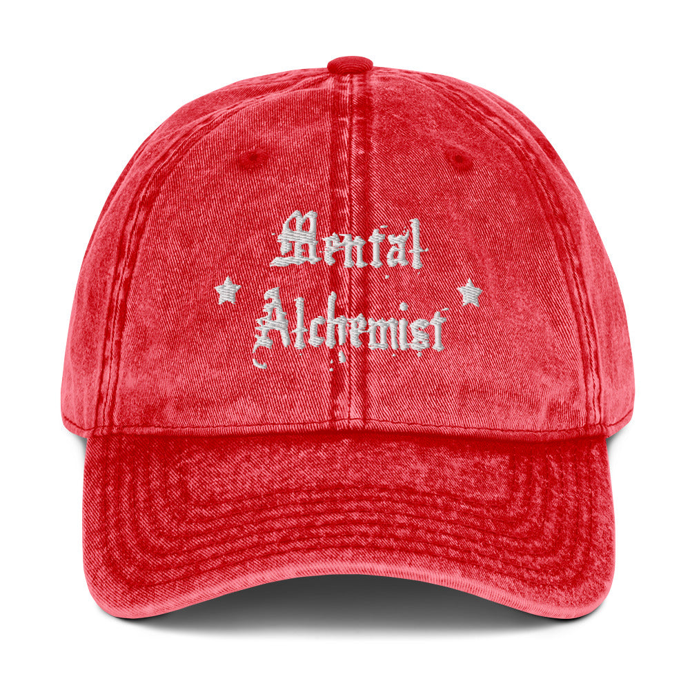 vintage denim cap red, with image phrase: "Mental Alchemist." Front view.