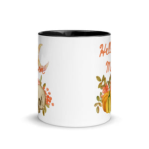 11 oz. white ceramic coffee/tea mug with solid black handle, rim, and inside. Image Design:  watercolor pumpkin, and skull, leaves and berries behind. Crescent moon in background. Image phrase: Hello Mabon. Center front view. Halloween, spooky season.