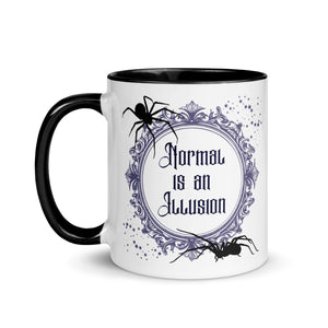 11 oz. white ceramic coffee/tea mug with solid black handle, rim, and inside. Image Design: Words 'Normal is an Illusion' in a elegant border, with spider silhouettes, and stars. Image phrase: Normal is an Illusion. Left hand side view. Halloween, spooky season.