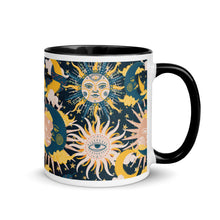 Load image into Gallery viewer, enchanting ceramic coffee tea mug featuring a wraparound image of an abstract sun, moon, and star pattern. black colorful rim, handle, and inside mug. Colors in pattern: golden yellow, dark teal, peach coral. side view, handle to right side..
