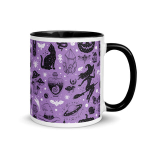 11 oz. white ceramic coffee/tea mug with solid black handle, rim, and inside. Image Design: Halloween theme pattern of witch on broom, pumpkins, spiders, cats, potion bottles, snails, bats, mushrooms, with a cosmic tone. Purple background color. Right hand side view. Halloween, spooky season.