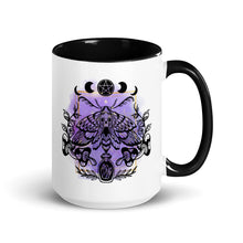 Load image into Gallery viewer, 15 oz. white ceramic coffee/tea mug with solid black handle, rim, and inside. Design: Moth with a skull, moon phases, pentacle, mushrooms, and a crystal vial. right hand side view.
