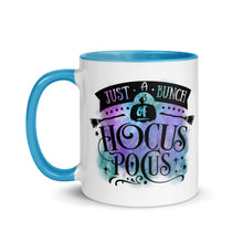 Load image into Gallery viewer, 11 oz. white ceramic coffee/tea mug with solid light blue handle, rim, and inside. Image Design: phrase &quot;just a bunch of Hocus Pocus, with mini image of pumpkin and broom,  whimsical font. backed by blue and purple cosmic cloud. Image phrase: Just a bunch of Hocus Pocus. Left hand side view. Halloween, spooky season.
