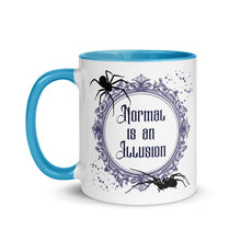 Load image into Gallery viewer, 11 oz. white ceramic coffee/tea mug with solid light blue handle, rim, and inside. Image Design: Words &#39;Normal is an Illusion&#39; in a elegant border, with spider silhouettes, and stars. Image phrase: Normal is an Illusion. Left hand side view. Halloween, spooky season.
