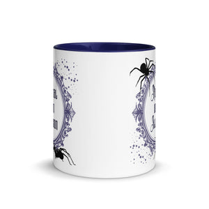 11 oz. white ceramic coffee/tea mug with solid navy blue handle, rim, and inside. Image Design: Words 'Normal is an Illusion' in a elegant border, with spider silhouettes, and stars. Image phrase: Normal is an Illusion. Center front view. Halloween, spooky season.