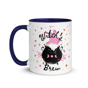 11 oz. white ceramic coffee/tea mug with solid navy blue handle, rim, and inside. Image Design: cute whimsical cauldron with moon phase on cauldron, in the background are hearts, stars. Image phrase: Witch's brew. Left hand side view. Halloween, spooky season.